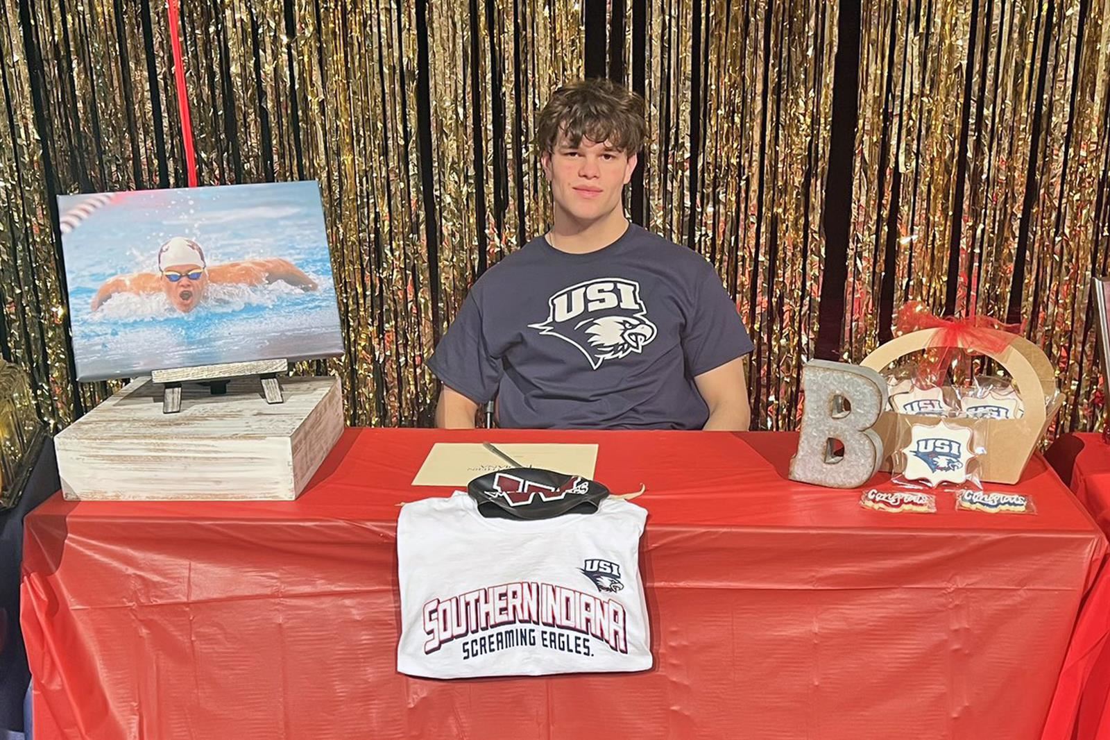 Cypress Woods High School senior Brock Borak signed a letter of intent to swim at the University of Southern Indiana.